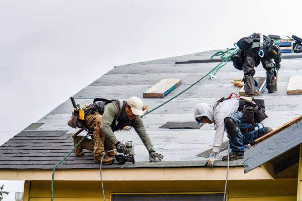 Professional Storm Damage Roof Repair technician working in Tuckahoe, NY